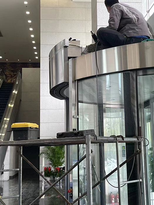 巨恒不锈钢型圆弧门旋转门圆形转门智能电热风幕机定制安装现场