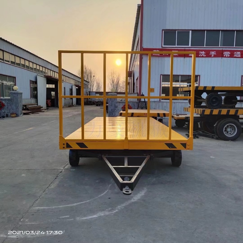 工厂平板牵引货物运输车 车站机场行李搬运 仓库货物周转车